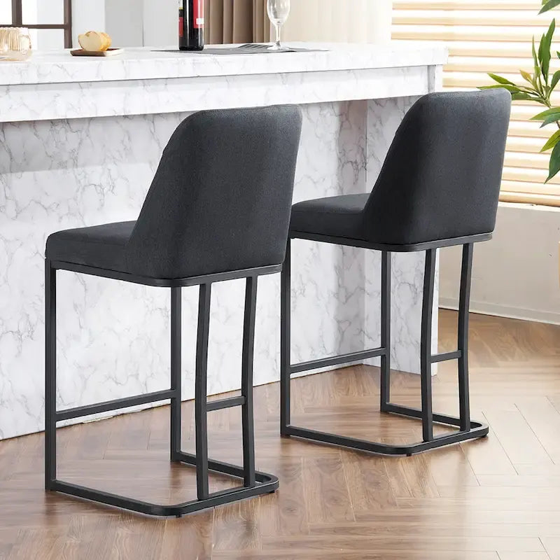 Juego de 2 taburetes de bar tapizados en beige/gris, respaldo alto con botones capitoné, estructura de metal