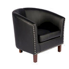 Sillón individual tipo barril de piel sintética con detalles de tachuelas