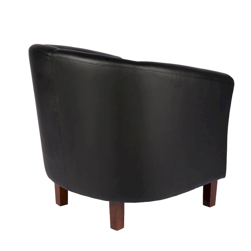 Sillón individual tipo barril de piel sintética con detalles de tachuelas