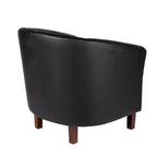 Sillón individual tipo barril de piel sintética con detalles de tachuelas