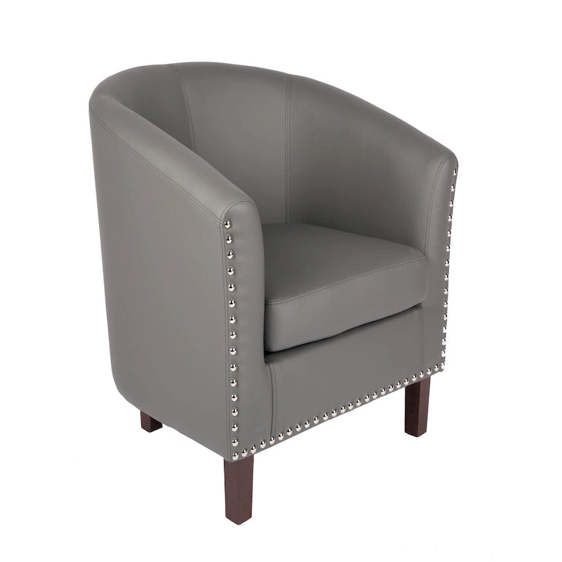 Sillón individual tipo barril de piel sintética con detalles de tachuelas
