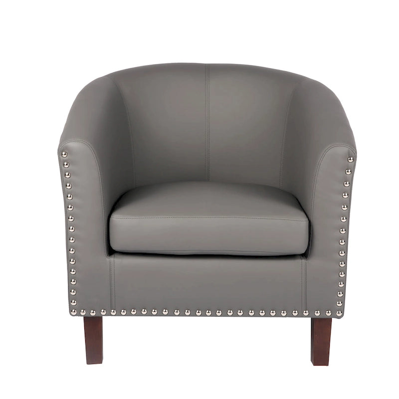 Sillón individual tipo barril de piel sintética con detalles de tachuelas