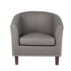 Sillón individual tipo barril de piel sintética con detalles de tachuelas