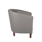 Sillón individual tipo barril de piel sintética con detalles de tachuelas