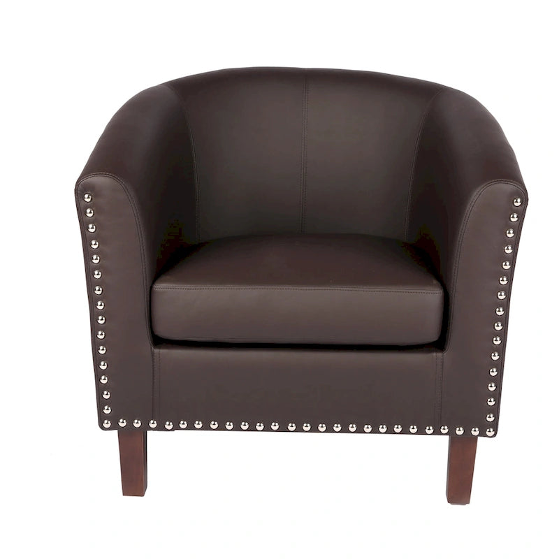 Sillón individual tipo barril de piel sintética con detalles de tachuelas