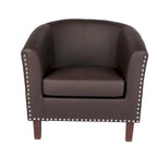 Sillón individual tipo barril de piel sintética con detalles de tachuelas